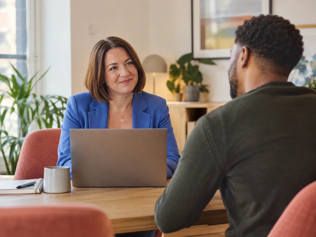 Recruitment consultant meeting with an adult candidate